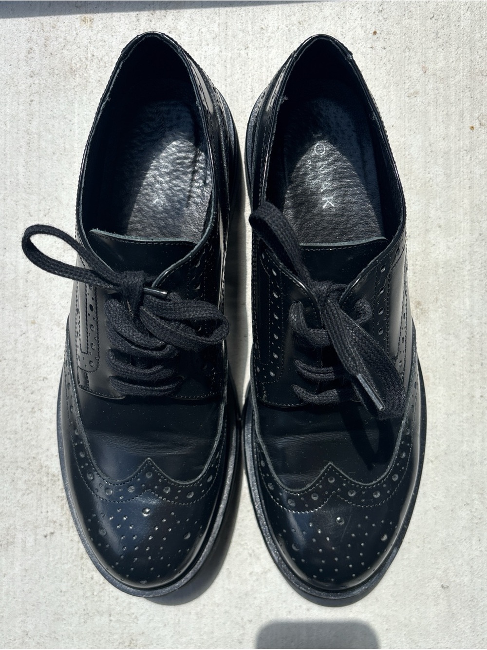 Classic Black Wingtip Lace-Up Flats
